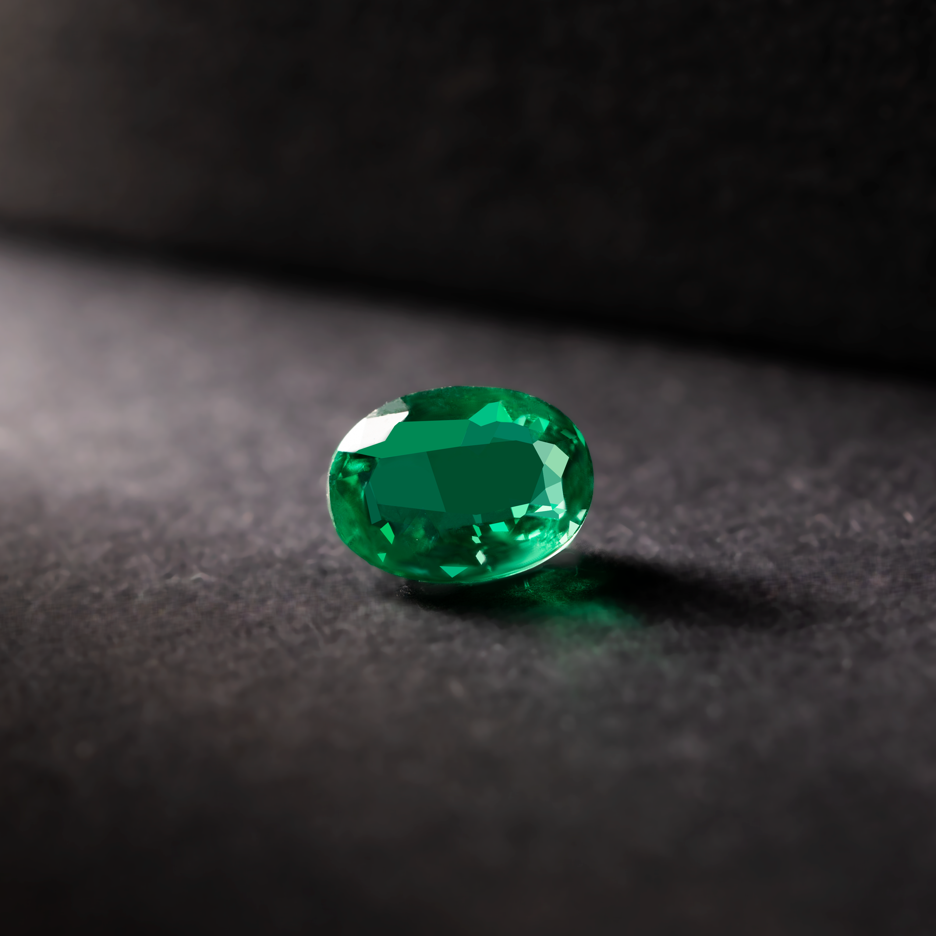 Oval Natural Colored Emerald Vivid Green 0.76 CT